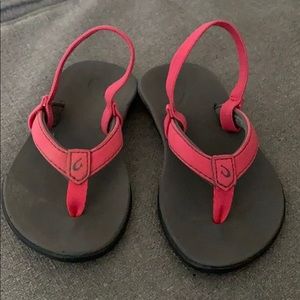 Size 9 toddler OluKai flip flops- never worn.